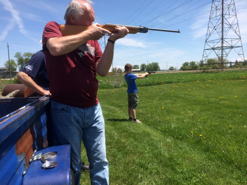 Grandad & Austin doing some plinking with pellet guns.